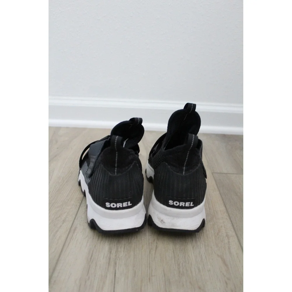 Sorel Kinetic Sneak‎ Black White Scalloped Sole Strap Sneakers NL2909-010 Womens